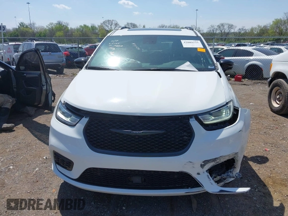 2023 Chrysler Pacifica Limited with VIN 2C4RC1GG6PR540220, listed as a IAAI auction lot 42009535 with 29,339 mi miles and . Bid and sale history available at DreamBid. Image 12.