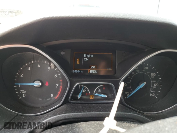2015 Ford Focus SE z VIN 1FADP3F29FL312757, wystawiony jako Copart lot #61198315 z przebiegiem 84 944 mil mil oraz Szkoda całkowita • Salvage title. Historia ofert i sprzedaży dostępna na DreamBid. Obrazek 9.