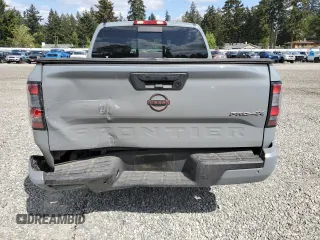 2023 Nissan Frontier SV with VIN 1N6ED1EKXPN610735, listed as a Copart auction lot 56197375 with 55,005 mi miles and Salvage title. Bid and sale history available at DreamBid. Image 6.