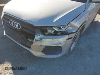 2017 Audi Q3 Premium Plus z VIN WA1JCCFS5HR011907, wystawiony jako IAAI lot #41675496 z przebiegiem 102 591 mil mil oraz . Historia ofert i sprzedaży dostępna na DreamBid. Obrazek 18.