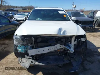 2018 Mazda CX-9 Grand Touring with VIN JM3TCADY6J0229768, listed as a IAAI auction lot 41724072 with 80,918 mi miles and . Bid and sale history available at DreamBid. Image 13.