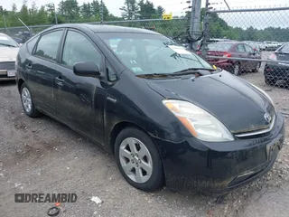 2006 Toyota Prius z VIN JTDKB20U967529397, wystawiony jako IAAI lot #42451750 z przebiegiem 240 512 mil mil oraz . Historia ofert i sprzedaży dostępna na DreamBid. Obrazek 1.