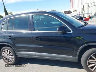 2015 Volkswagen Tiguan SE with VIN WVGAV7AX5FW509612, listed as a IAAI auction lot 42020599 with 64,201 mi miles and . Bid and sale history available at DreamBid. Image 13.