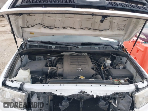 2013 Toyota Tundra z VIN 5TFRM5F19DX064236, wystawiony jako IAAI lot #41701170 z przebiegiem 147 312 mil mil oraz . Historia ofert i sprzedaży dostępna na DreamBid. Obrazek 10.