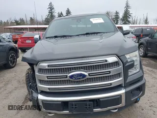 2015 Ford F-150 XLT with VIN 1FTEW1EGXFFC41635, listed as a IAAI auction lot 41765722 with 128,844 mi miles. Bid and sale history available at carsss.com. Image 12.