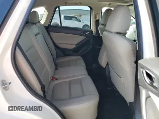 2015 Mazda CX-5 Grand Touring with VIN JM3KE2DY1F0453386, listed as a Copart auction lot 50580185 with 174,309 mi miles and Salvage Title. Bid and sale history available at carsss.com. Image 11.