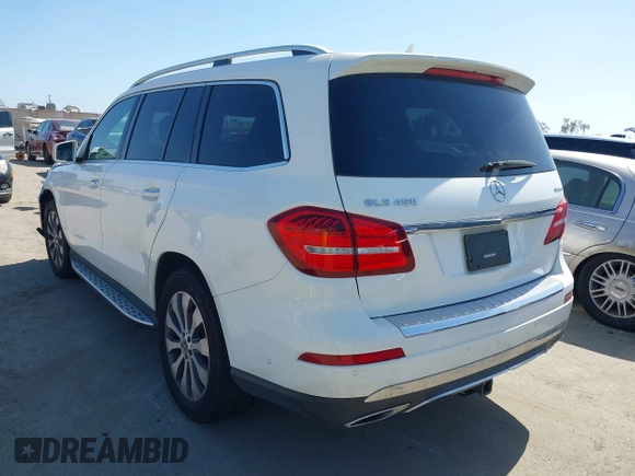 2018 Mercedes-Benz GLS 450 with VIN 4JGDF6EE6JB132415, listed as a IAAI auction lot 42283484 with 54,090 mi miles and . Bid and sale history available at DreamBid. Image 3.