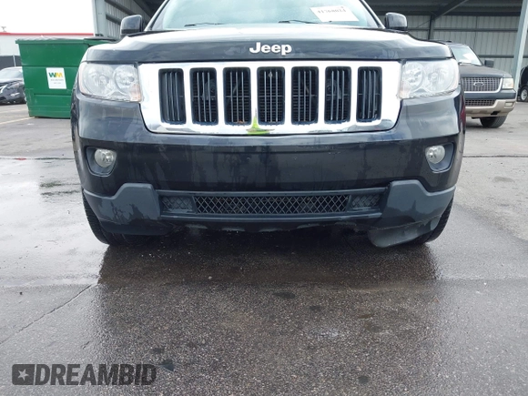 2012 Jeep Grand Cherokee Laredo with VIN 1C4RJEAG2CC259279, listed as a IAAI auction lot 41768024 with 185,161 mi miles. Bid and sale history available at carsss.com. Image 6.