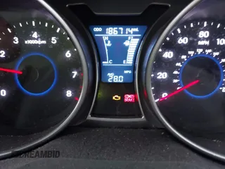 2013 Hyundai Veloster w/Gray Int with VIN KMHTC6AD8DU171050, listed as a IAAI auction lot 41992468 with 186,714 mi miles and . Bid and sale history available at DreamBid. Image 7.