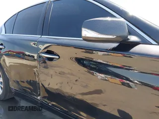 2015 Infiniti Q50 Premium with VIN JN1BV7AP9FM355526, listed as a IAAI auction lot 42010401 with 67,131 mi miles. Bid and sale history available at carsss.com. Image 6.