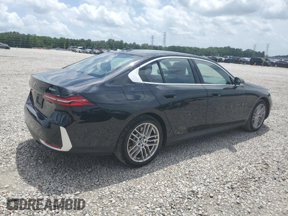 2024 BMW 5 Series 530i with VIN WBA43FJ09RCR05243, listed as a Copart auction lot 61690705 with 34,450 mi miles and Salvage title. Bid and sale history available at DreamBid. Image 3.