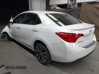 2017 Toyota Corolla L with VIN 5YFBURHE7HP693037, listed as a IAAI auction lot 42304020 with 117,710 mi miles and . Bid and sale history available at DreamBid. Image 3.