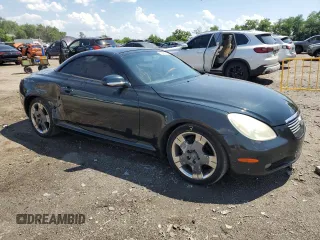 2004 Lexus SC 430 with VIN JTHFN48Y040052035, listed as a Copart auction lot 63689275 with 147,355 mi miles and Salvage title. Bid and sale history available at DreamBid. Image 4.