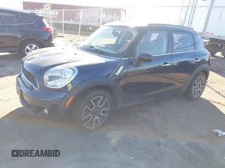 2011 MINI Countryman S with VIN WMWZC5C54BWL55124, listed as a IAAI auction lot 41666874 with 197,656 mi miles and . Bid and sale history available at DreamBid. Image 2.