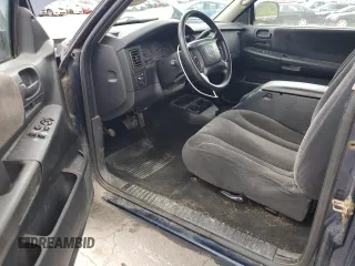 2002 Dodge Dakota z VIN 1B7GG32X32S546515, wystawiony jako Copart lot #57888695 z przebiegiem 81 202 mil mil oraz Szkoda całkowita • Salvage title. Historia ofert i sprzedaży dostępna na DreamBid. Obrazek 8.