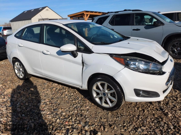 2019 Ford Fiesta SE with VIN 3FADP4BJ9KM124350, listed as a Copart auction lot 47669205 with 96,141 mi miles and Salvage Title. Bid and sale history available at carsss.com. Image 4.
