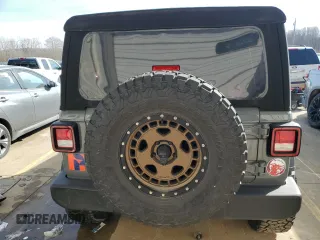 2023 Jeep Wrangler Sport S with VIN 1C4HJXDG8PW675134, listed as a Copart auction lot 85949314 with 19,128 mi miles and Salvage Title. Bid and sale history available at DreamBid. Image 6.
