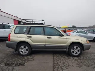 2003 Subaru Forester XS with VIN JF1SG65663H753306, listed as a IAAI auction lot 41311689 with 253,269 mi miles. Bid and sale history available at carsss.com. Image 13.