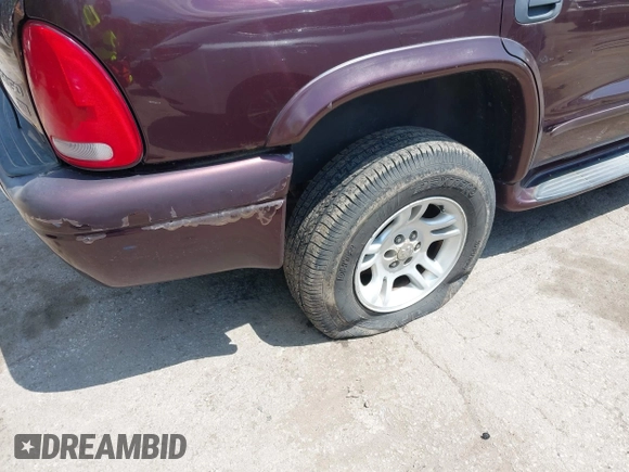 2003 Dodge Durango SLT Plus z VIN 1D4HS58N03F586049, wystawiony jako IAAI lot #42154236 z przebiegiem 253 727 mil mil oraz . Historia ofert i sprzedaży dostępna na DreamBid. Obrazek 6.