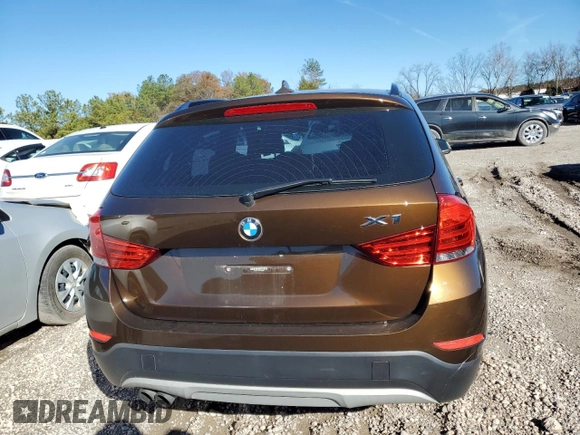 2015 BMW X1 sDrive28i with VIN WBAVM1C54FV316825, listed as a Copart auction lot 83592644 with 76,823 mi miles and Salvage Title. Bid and sale history available at carsss.com. Image 6.