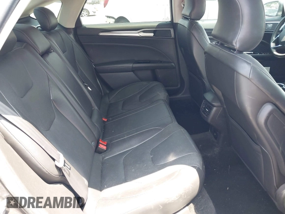 2016 Ford Fusion Titanium with VIN 3FA6P0SU1GR304590, listed as a IAAI auction lot 42381545 with 136,684 mi miles and . Bid and sale history available at DreamBid. Image 8.