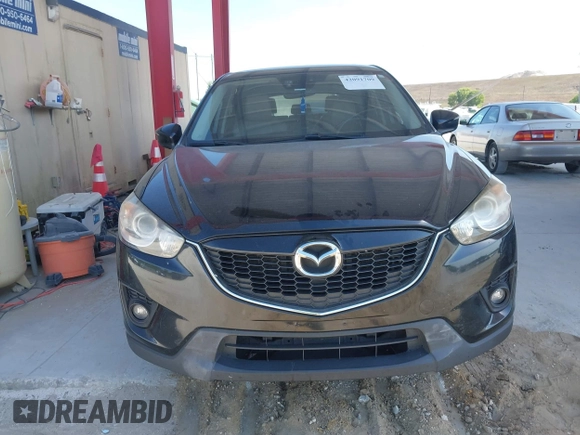 2015 Mazda CX-5 Grand Touring with VIN JM3KE4DY7F0481883, listed as a IAAI auction lot 42091709 with 184,248 mi miles and . Bid and sale history available at DreamBid. Image 13.