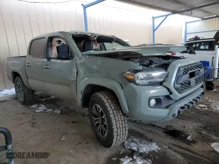 2023 Toyota Tacoma 4WD SR with VIN 3TMCZ5AN5PM538629, listed as a Copart auction lot 41925845 with 30,672 mi miles and Salvage Title. Bid and sale history available at carsss.com. Image 4.