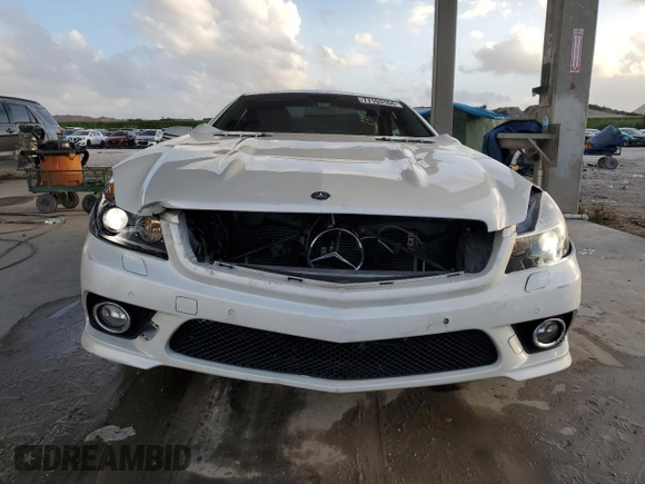 2011 Mercedes-Benz SL 550 z VIN WDBSK7BAXBF161245, wystawiony jako Copart lot #77153164 z przebiegiem 100 997 mil mil oraz Szkoda całkowita • Salvage title. Historia ofert i sprzedaży dostępna na DreamBid. Obrazek 5.