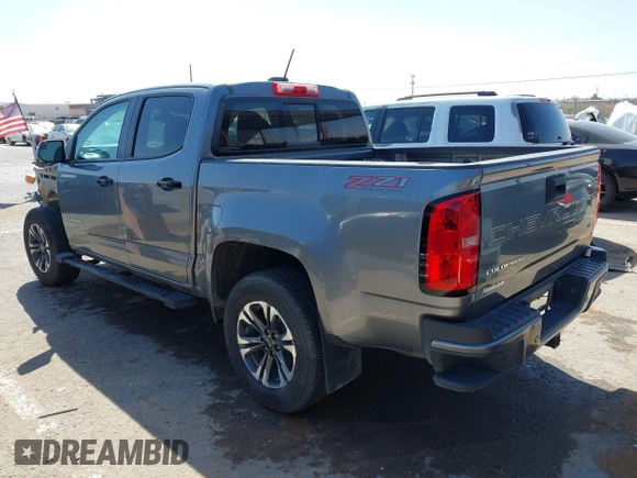 2021 Chevrolet Colorado 4WD Z71 z VIN 1GCGTDEN7M1117558, wystawiony jako IAAI lot #41911673 z przebiegiem 51 838 mil mil oraz . Historia ofert i sprzedaży dostępna na DreamBid. Obrazek 3.