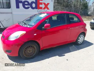 2009 Toyota Yaris with VIN JTDJT903X95251943, listed as a IAAI auction lot 42124300 with 193,503 mi miles. Bid and sale history available at carsss.com. Image 12.