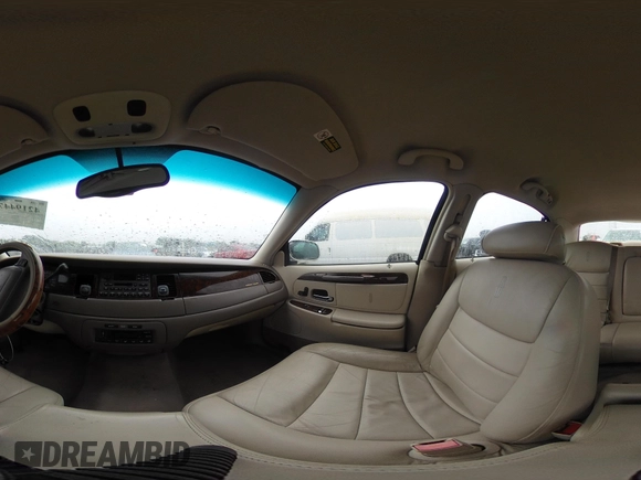 2002 Lincoln Town Car Executive z VIN 1LNHM81W42Y636204, wystawiony jako IAAI lot #42194479 z przebiegiem Nie podano mil oraz . Historia ofert i sprzedaży dostępna na DreamBid. Obrazek 18.