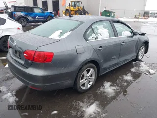 2014 Volkswagen Jetta TDI w/Premium/Nav с VIN 3VWLL7AJ4EM332920, выставлен на аукционе IAAI как лот 41630948 с пробегом 148 754 миль миль и . История ставок и продаж доступна на DreamBid. Изображение 4.