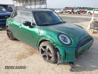 2022 MINI Hardtop 4 Door Cooper z VIN WMW33DK04N2P84250, wystawiony jako IAAI lot #42059692 z przebiegiem 34 238 mil mil oraz . Historia ofert i sprzedaży dostępna na DreamBid. Obrazek 1.