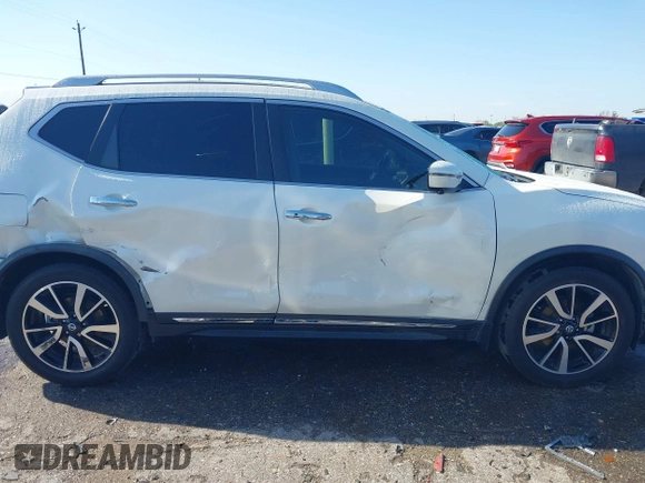 2018 Nissan Rogue S with VIN JN8AT2MT4JW469784, listed as a IAAI auction lot 41827157 with 67,838 mi miles and . Bid and sale history available at carsss.com. Image 12.