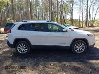 2014 Jeep Cherokee Limited with VIN 1C4PJLDS9EW238121, listed as a IAAI auction lot 41811278 with 185,240 mi miles. Bid and sale history available at carsss.com. Image 13.