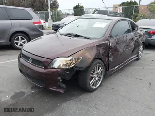 2006 Scion tC with VIN JTKDE177560086287, listed as a IAAI auction lot 41804286 with 276,772 mi miles. Bid and sale history available at carsss.com. Image 2.