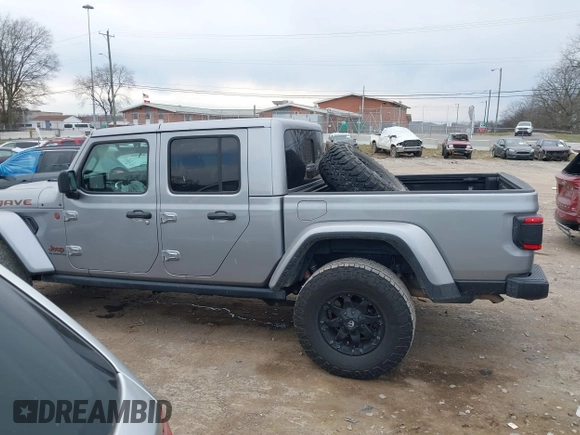 2021 Jeep Gladiator Mojave with VIN 1C6JJTEG9ML519309, listed as a IAAI auction lot 41701544 with 64,461 mi miles and . Bid and sale history available at DreamBid. Image 14.