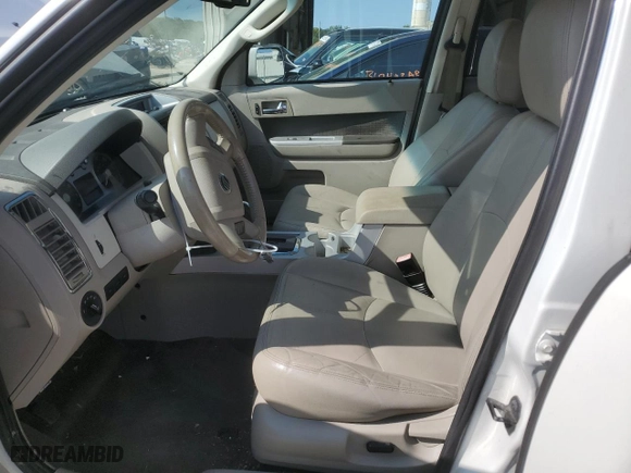 2010 Mercury Mariner Premier with VIN 4M2CN8HG5AKJ23663, listed as a Copart auction lot 70490444 with 154,328 mi miles and Salvage Title. Bid and sale history available at carsss.com. Image 7.