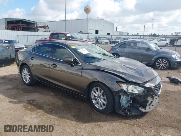 2016 Mazda Mazda6 i Sport with VIN JM1GJ1U56G1422012, listed as a IAAI auction lot 40693636 with 93,094 mi miles. Bid and sale history available at carsss.com. Image 1.