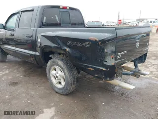 2006 Dodge Dakota SLT with VIN 1D7HE48N16S611010, listed as a IAAI auction lot 41018277 with 182,335 mi miles. Bid and sale history available at carsss.com. Image 6.