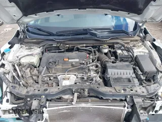 2018 Honda Civic LX with VIN 2HGFC2F5XJH603214, listed as a IAAI auction lot 41788384 with 114,876 mi miles and . Bid and sale history available at carsss.com. Image 10.