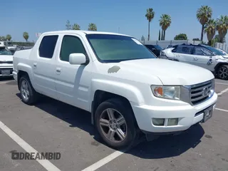 2013 Honda Ridgeline RTL with VIN 5FPYK1F50DB013612, listed as a IAAI auction lot 42430119 with 190,913 mi miles and . Bid and sale history available at DreamBid. Image 1.