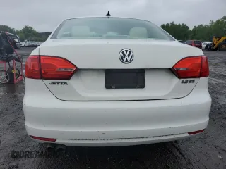 2013 Volkswagen Jetta SE z VIN 3VWBX7AJXDM432714, wystawiony jako Copart lot #61093845 z przebiegiem 69 098 mil mil oraz Czysty tytuł • Clean title. Historia ofert i sprzedaży dostępna na DreamBid. Obrazek 6.