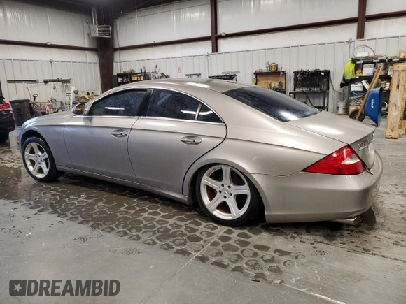2007 Mercedes-Benz CLS-Class 5.5L with VIN WDDDJ72X77A084281, listed as a Copart auction lot 51673165 with 248,113 mi miles and Salvage Title. Bid and sale history available at carsss.com. Image 2.