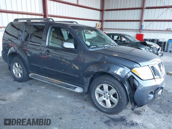 2011 Nissan Pathfinder LE z VIN 5N1AR1NB1BC616913, wystawiony jako IAAI lot #40627326 z przebiegiem 119 372 mil mil oraz . Historia ofert i sprzedaży dostępna na DreamBid. Obrazek 1.
