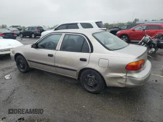 1999 Chevrolet Prizm z VIN 1Y1SK5284XZ403676, wystawiony jako Copart lot #57961725 z przebiegiem Nie podano mil oraz Szkody całkowita. Historia ofert i sprzedaży dostępna na DreamBid. Obrazek 2.