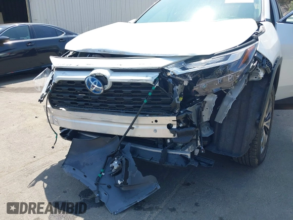 2024 Toyota RAV4 Hybrid XLE Premium with VIN JTMB6RFV9RJ063328, listed as a IAAI auction lot 42433233 with 9,874 mi miles and . Bid and sale history available at DreamBid. Image 6.