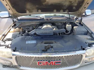 2004 GMC Yukon XL Denali with VIN 1GKFK66U24J283006, listed as a IAAI auction lot 42003275 with 348,268 mi miles. Bid and sale history available at carsss.com. Image 10.