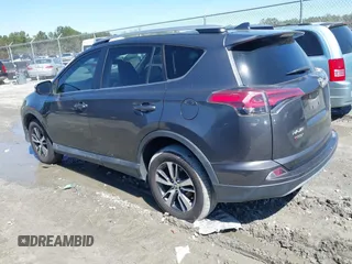 2018 Toyota RAV4 XLE with VIN 2T3WFREV9JW503136, listed as a IAAI auction lot 41815266 with 118,585 mi miles. Bid and sale history available at carsss.com. Image 3.