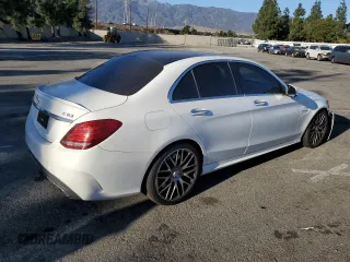 2017 Mercedes-Benz C 63 AMG with VIN 55SWF8GB0HU194099, listed as a Copart auction lot 84697274 with 79,948 mi miles and Salvage title. Bid and sale history available at DreamBid. Image 3.